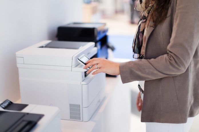 Woman making copies